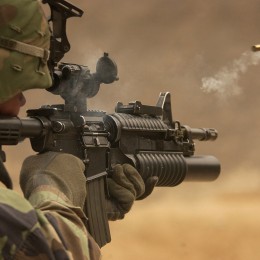 soldier with submachine gun rifle